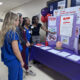 Stroke Program Coordinator Jackie Norris, RN, center, explains the risk factors of stroke to Lexi Allen, RN, Critical Care unit; Hope Meakins, CSR, BMG Golden Triangle Pulmonology; and Aaliya Young, nurse extern, ER